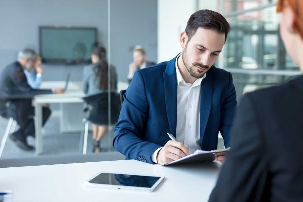 Job interview, businessman listen to candidate answers.